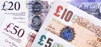 Photo of British pound bills.