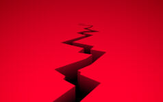 Image of a big black crack on red floor.