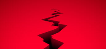 Image of a big black crack on red floor.