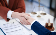 Simpson Thacher bolsters private funds bench Professionals shaking hands in lawyer office