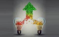 Churchill partners with Seviora on fund ABS Teaming up concept: two open glass light bulbs releasing gears cogs coming together in the shape of upward arrow symbol