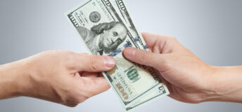 Hands sharing dollars on gray background.