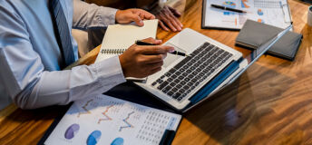 Administrator business man financial inspector and secretary making report calculating balance. Internal Revenue Service checking document. Audit concept