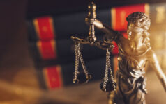 Gibson Dunn names head of NY fund finance team Statue Of Lady Justice in a lawyer office.