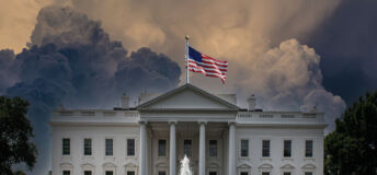 The White House with a stormy sky above.