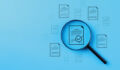 magnifying glass on note