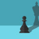 An illustration of a Pawn from a game of a chess, with the shadow its casting in the shape of a King piece, signifying increasing power