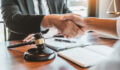 Businessman shaking hands to seal a deal Judges male lawyers Consultation legal services Consulting in regard to the various contracts to plan the case in court.