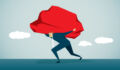 A businessman struggling to walk as he carries an enormous rock on his shoulders, symbolising a burden
