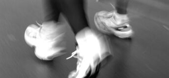Image of an athlete's feet while running.